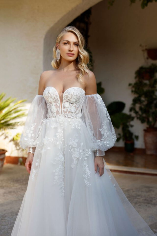 Boho-Brautkleider mit weiten Ärmeln, Spitze und Fransen